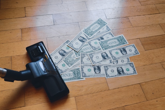 vacuuming up money to reduce your therapy marketing costs